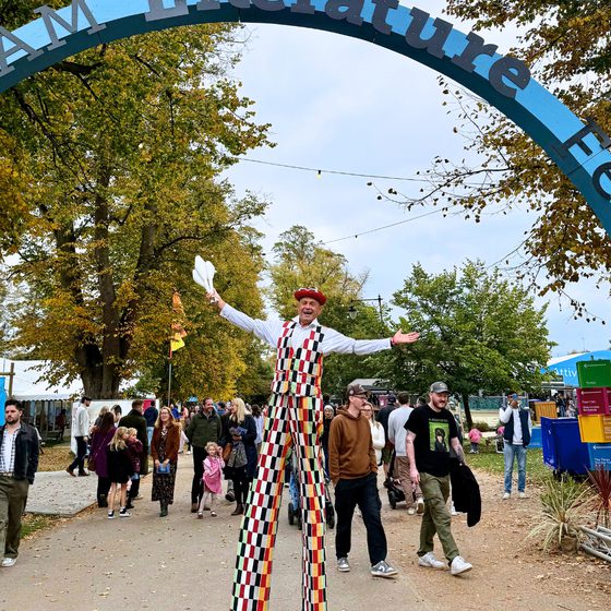 stilts walker under arch clf25