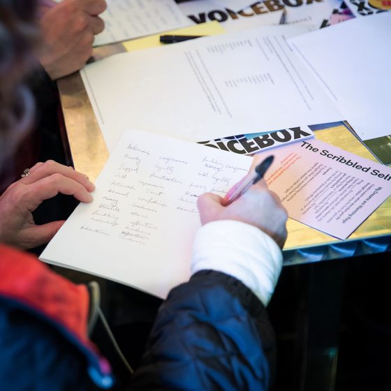 Participant taking part in writing activity