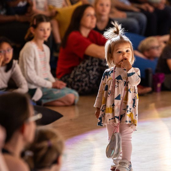 child at relaxed families concert