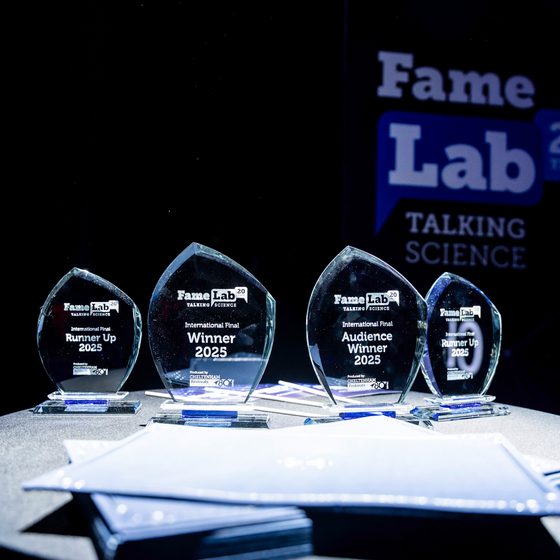FameLab International trophies positioned on-stage at the FameLab International Final 2025