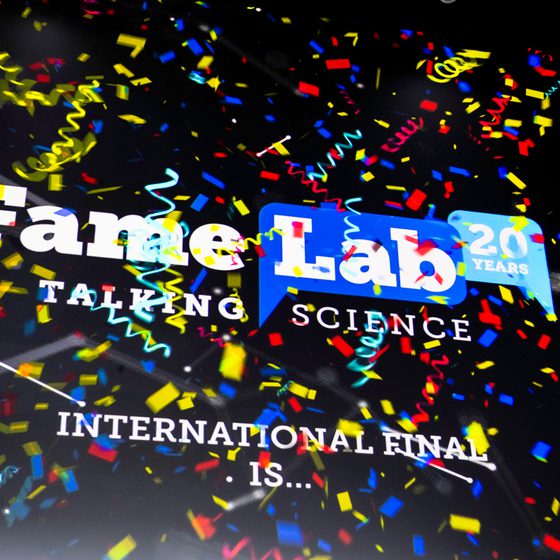 A stream of confetti on stage at the FameLab International Final 2025