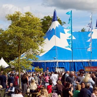 Large crowd by the Big Top venue