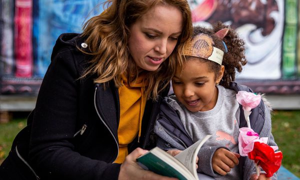 A mother reading to child