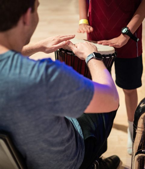 A musician and a child played the drums together