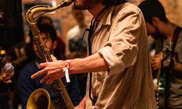 A man playing the saxophone