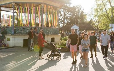 Bandstand with people walking past
