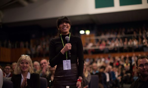 Someone in the crowd asking a question