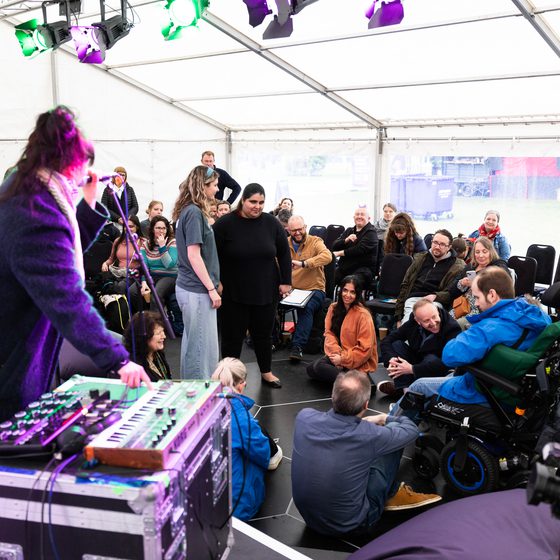 Crowd at Access to Music Conference on Haptic Dancefloor