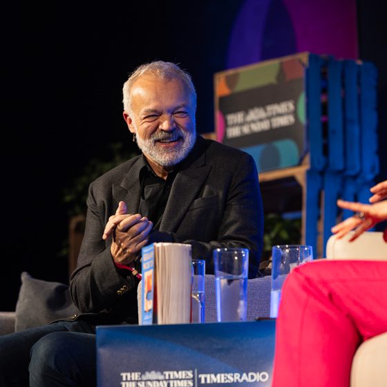 Graham Norton on stage at Cheltenham Literature Festival 2025.