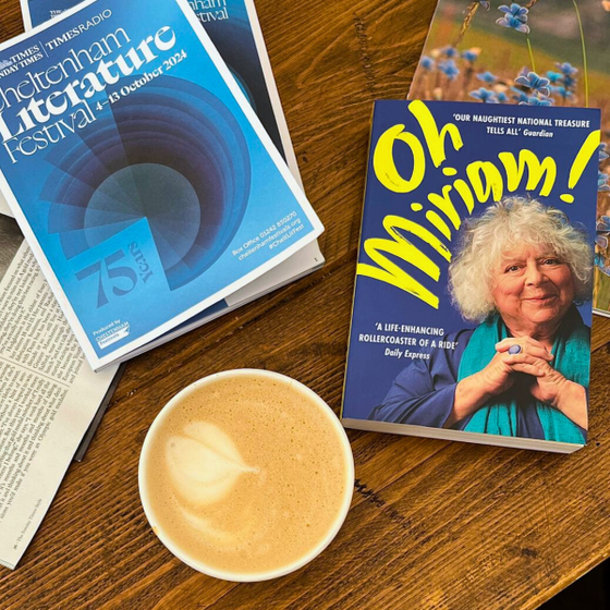 Book, coffee and brochure