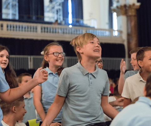 Children in crowd at Musicate event